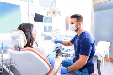 Naples emergency dentist answering a patient’s questions