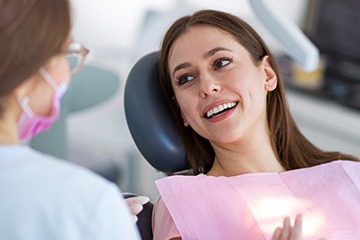 Smiling woman in dental chair