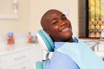 Man visiting his Naples dentist for tooth-colored fillings