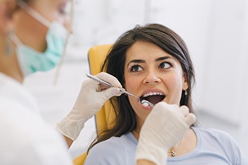Woman undergoing dental exam