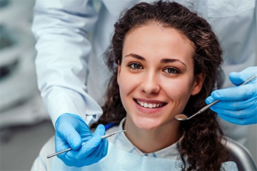 girl smiling in the dental chair