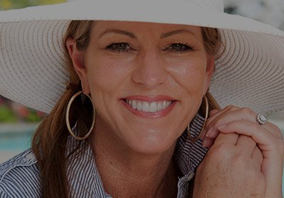 Smiling older woman with sun hat