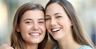 Two smiling young women