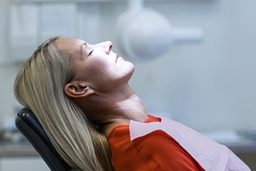 Relaxed woman in dental chair