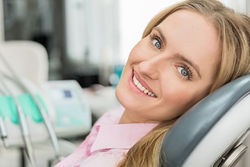 Smiling woman in dental chair